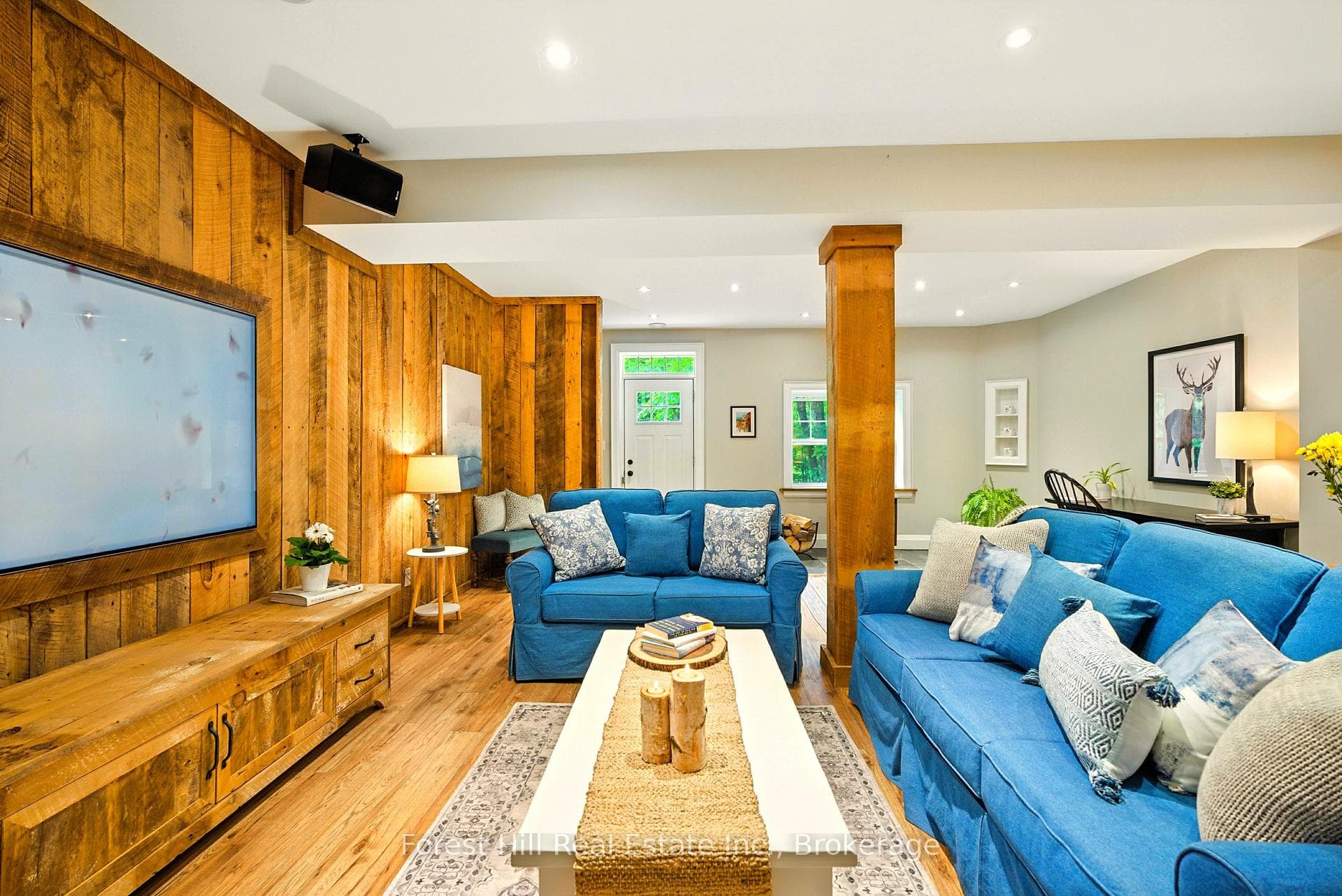 B/I big screen + surround sound on Hemlock wall.