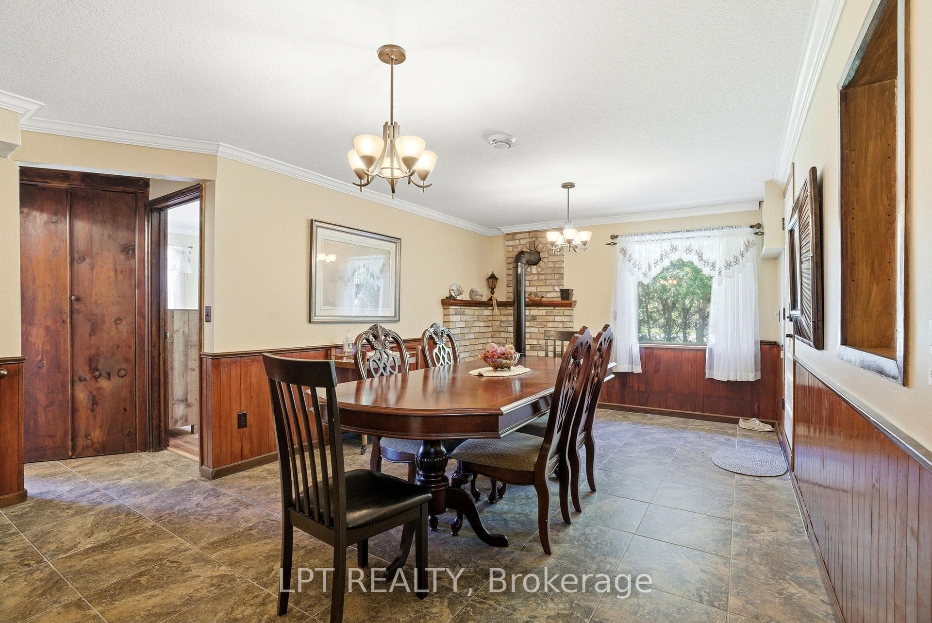 Dining room with wood stove perfect for ext family
