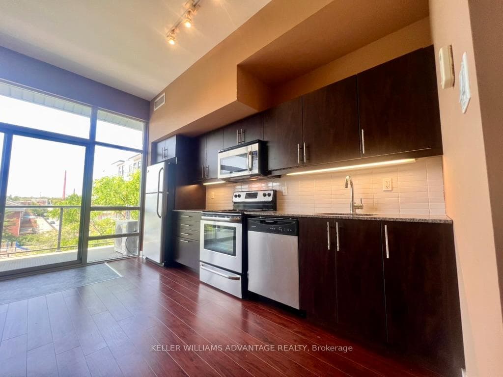 Kitchen with walkout to Balcony