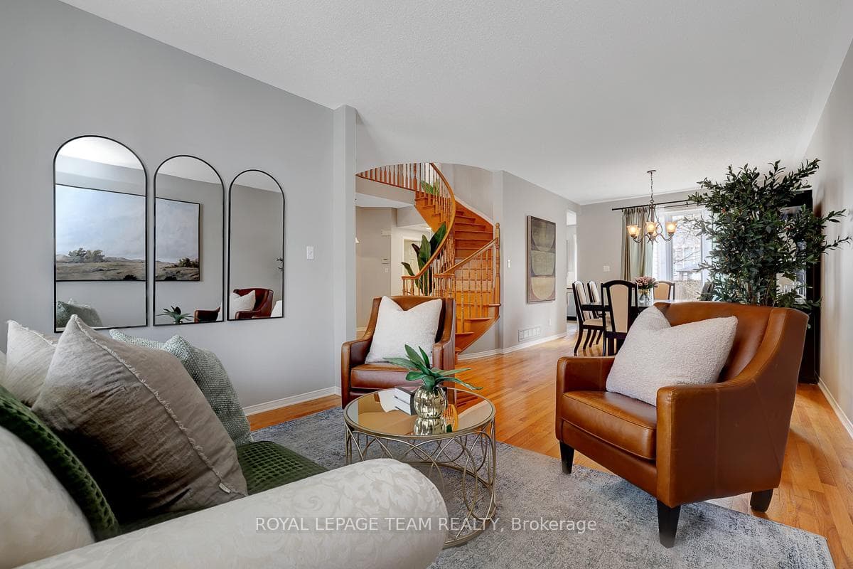The great room is the formal living + dining rooms