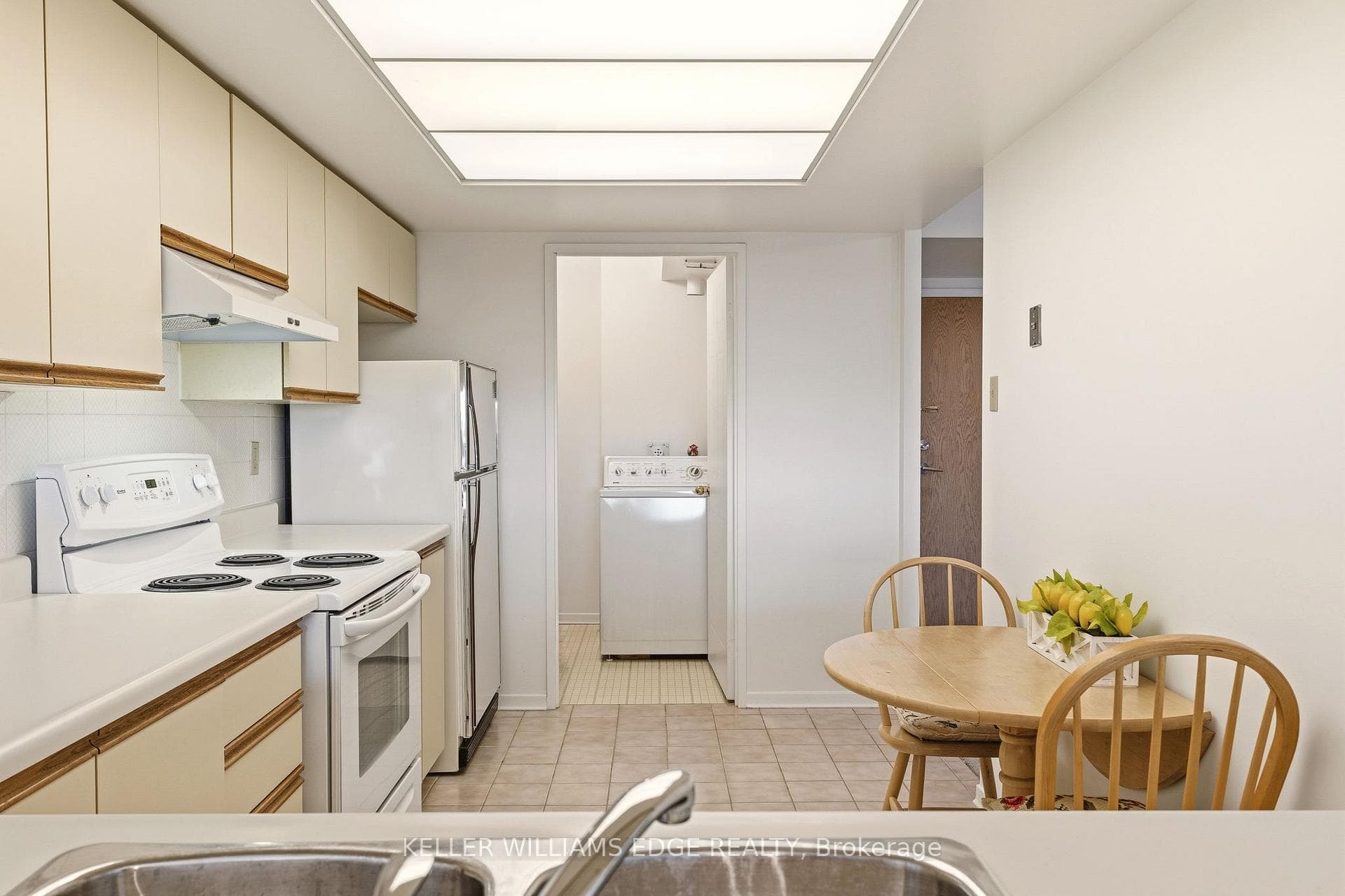 Kitchen w/ White Appliances