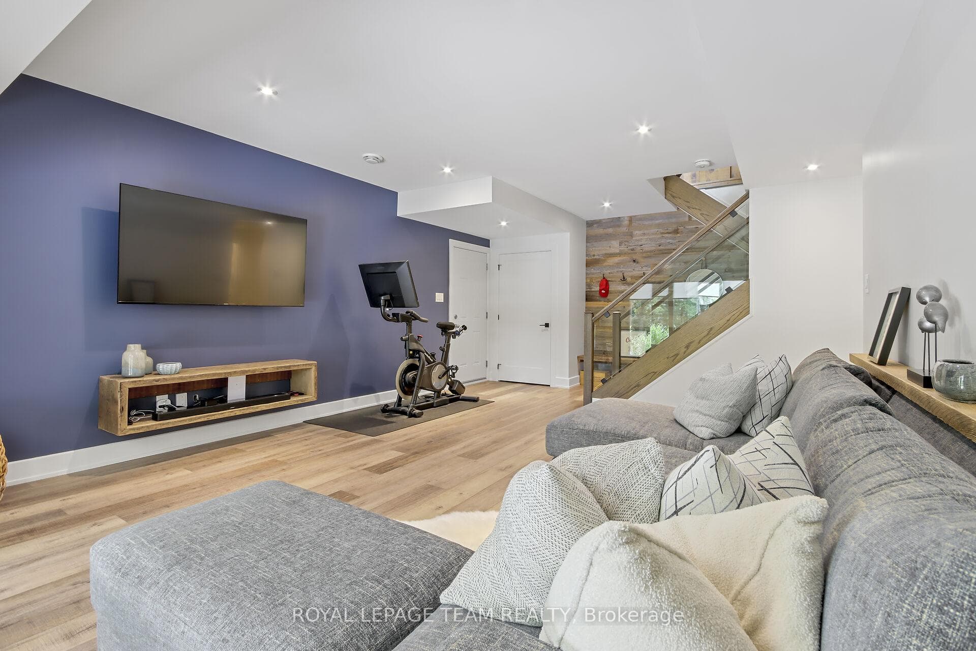 Lower family room, doors to patio & garage access.