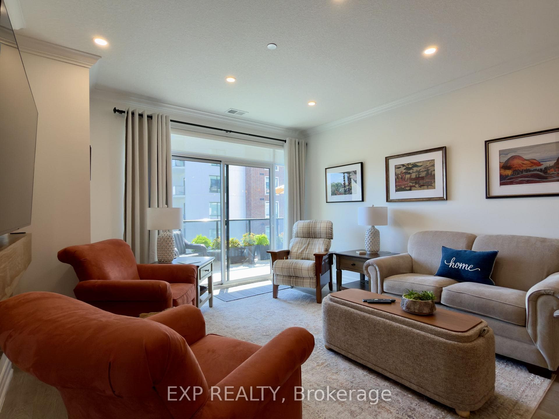 Bright living room with balcony access.