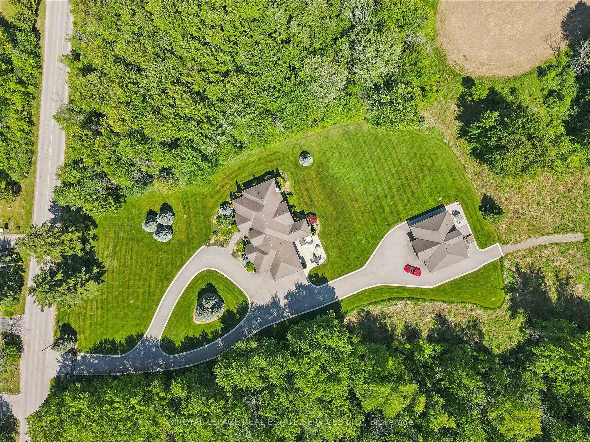 Sprawling 6.95 Acre Property Surrounded by Woods!