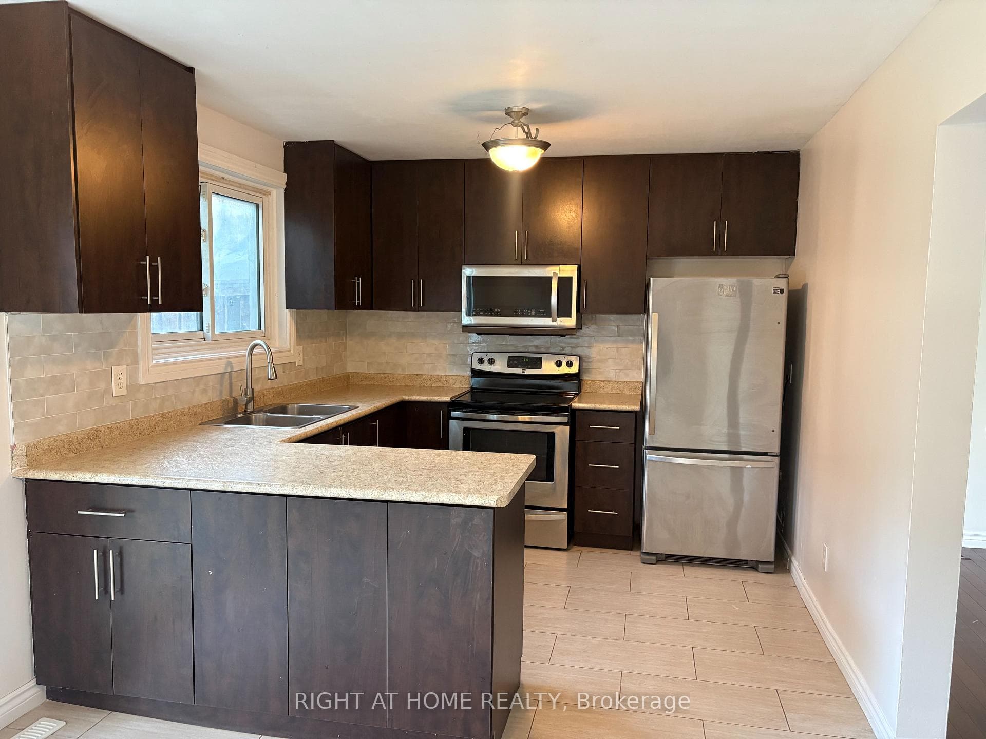 Loads of Cabinetry and Kitchen Work Space