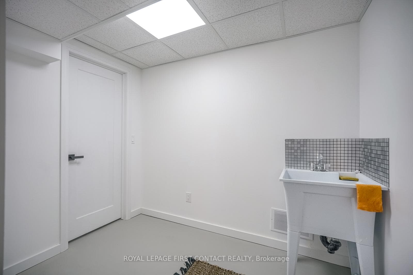 Tidy laundry room with all rough-ins