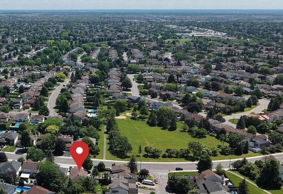 Positioned across from an expansive Park
