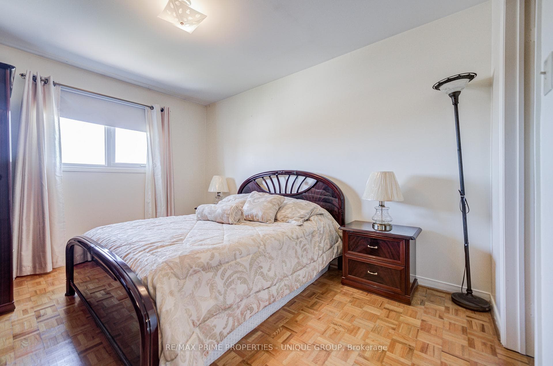 Primary bedroom overlooking backyard.