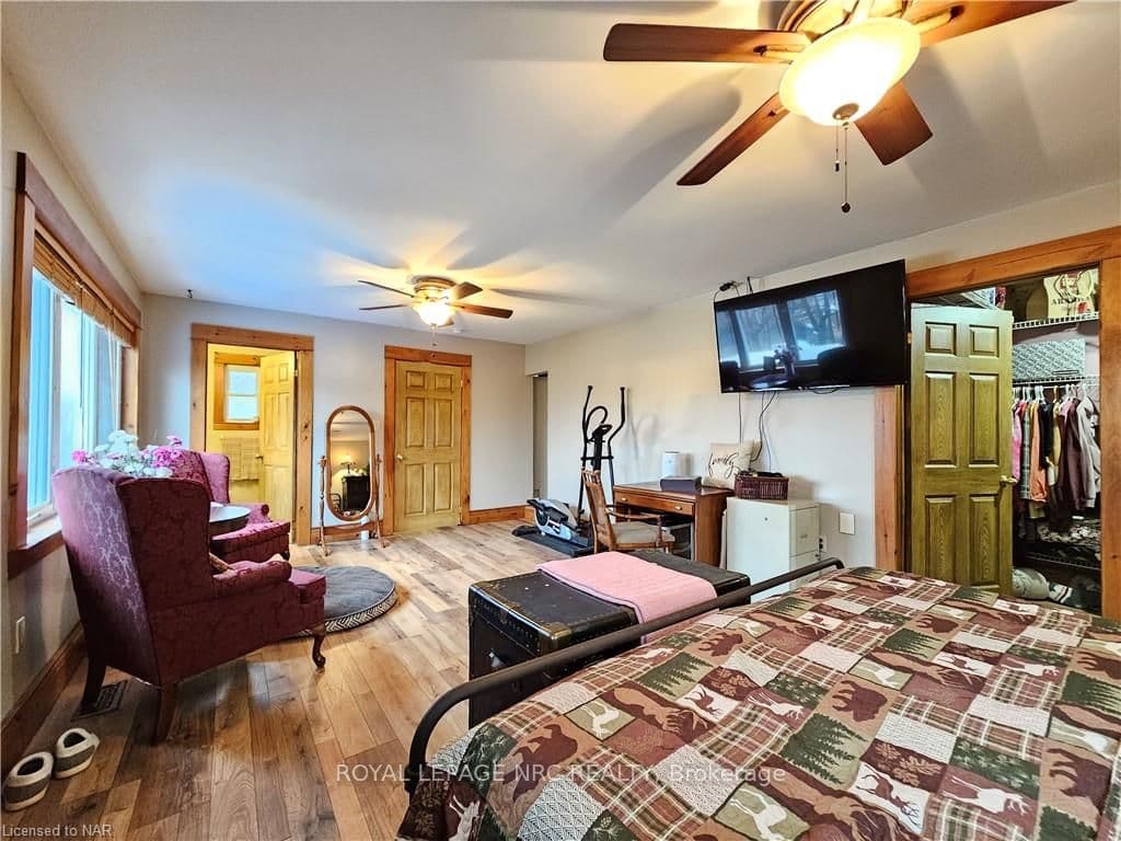 Primary Suite with 2nd staircase to main floor fam