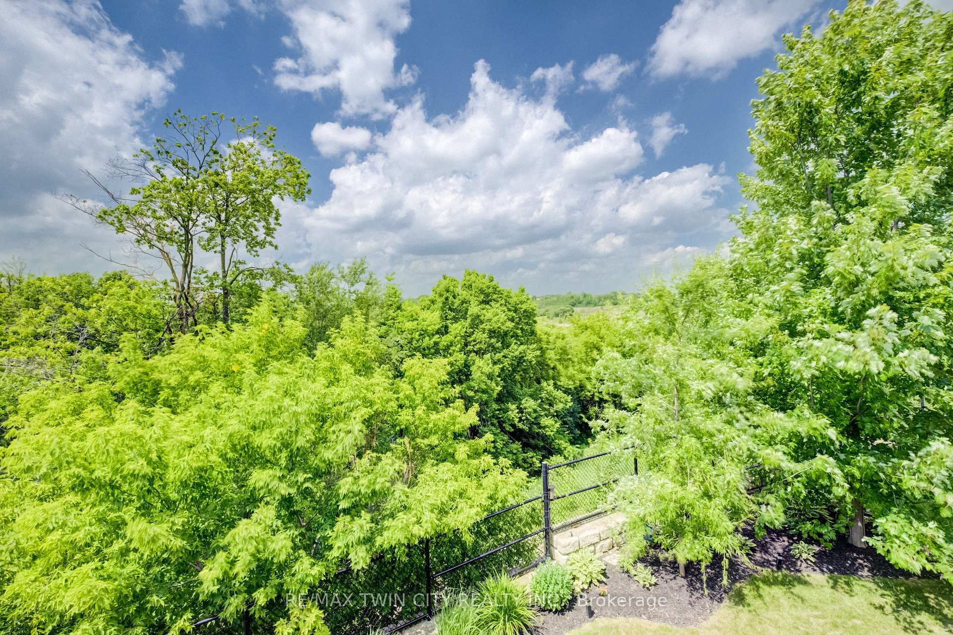 Set on a premium walkout lot with elevated views