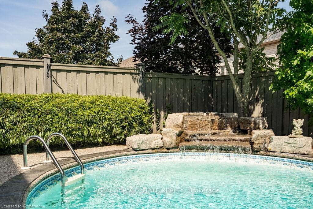 Heated Inground Salt water pool & Zen waterfall