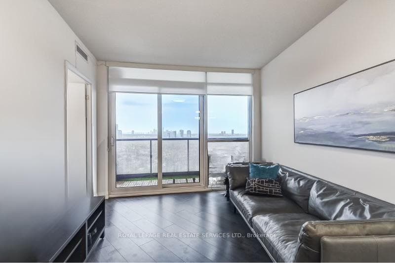 LR walk out to wide Terrace with city /lake views