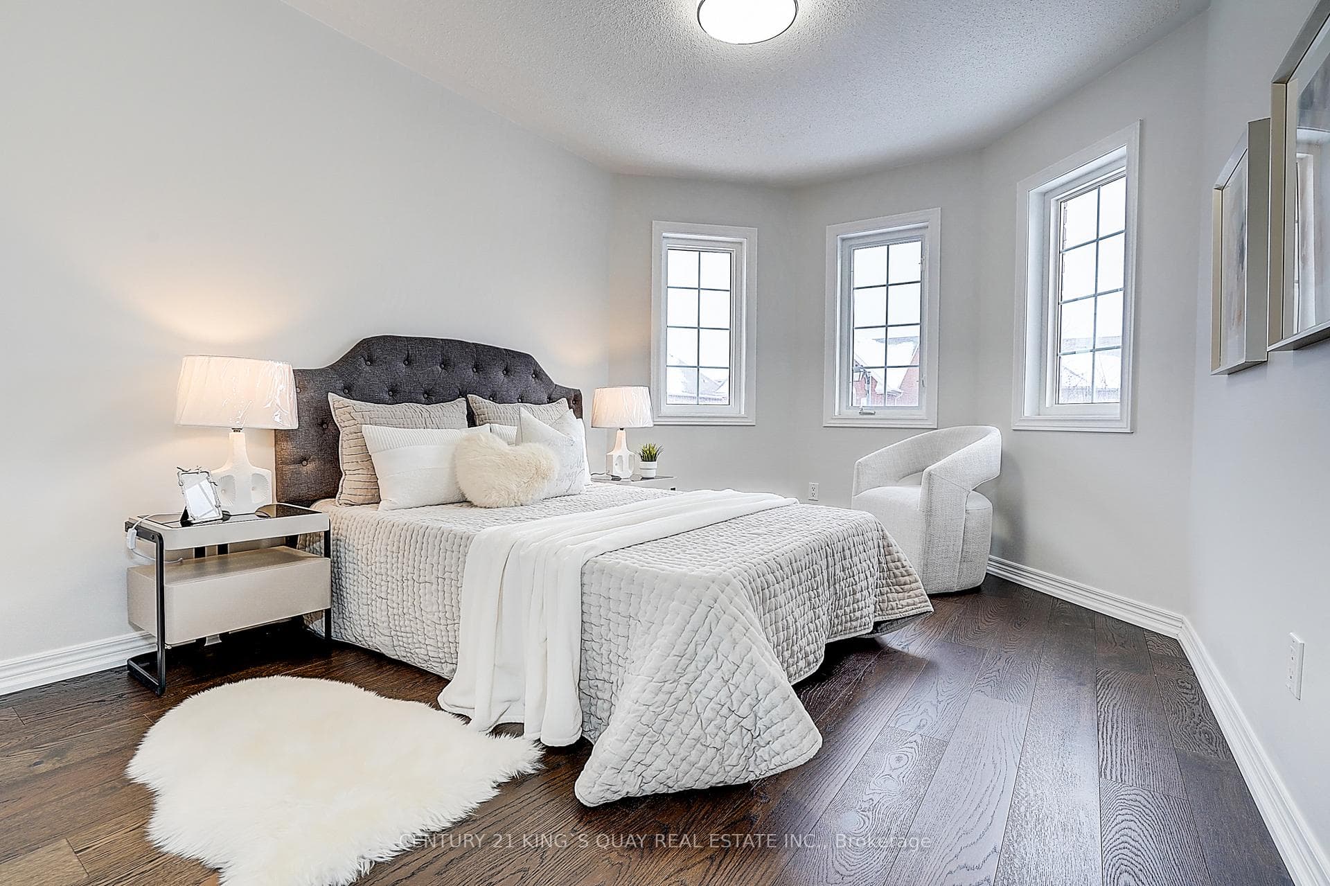 2nd BR with wood flooring, big windows & closet