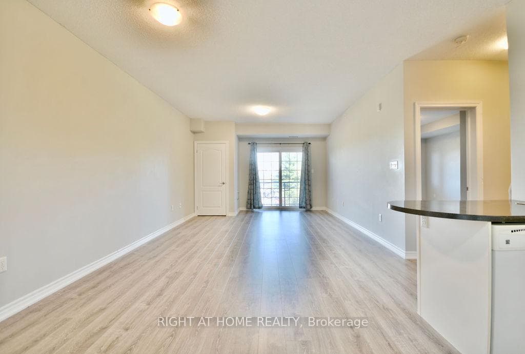 overlooking living room/dining area