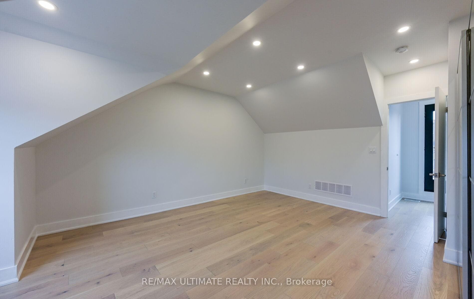 Third floor bedroom with vaulted ceiling