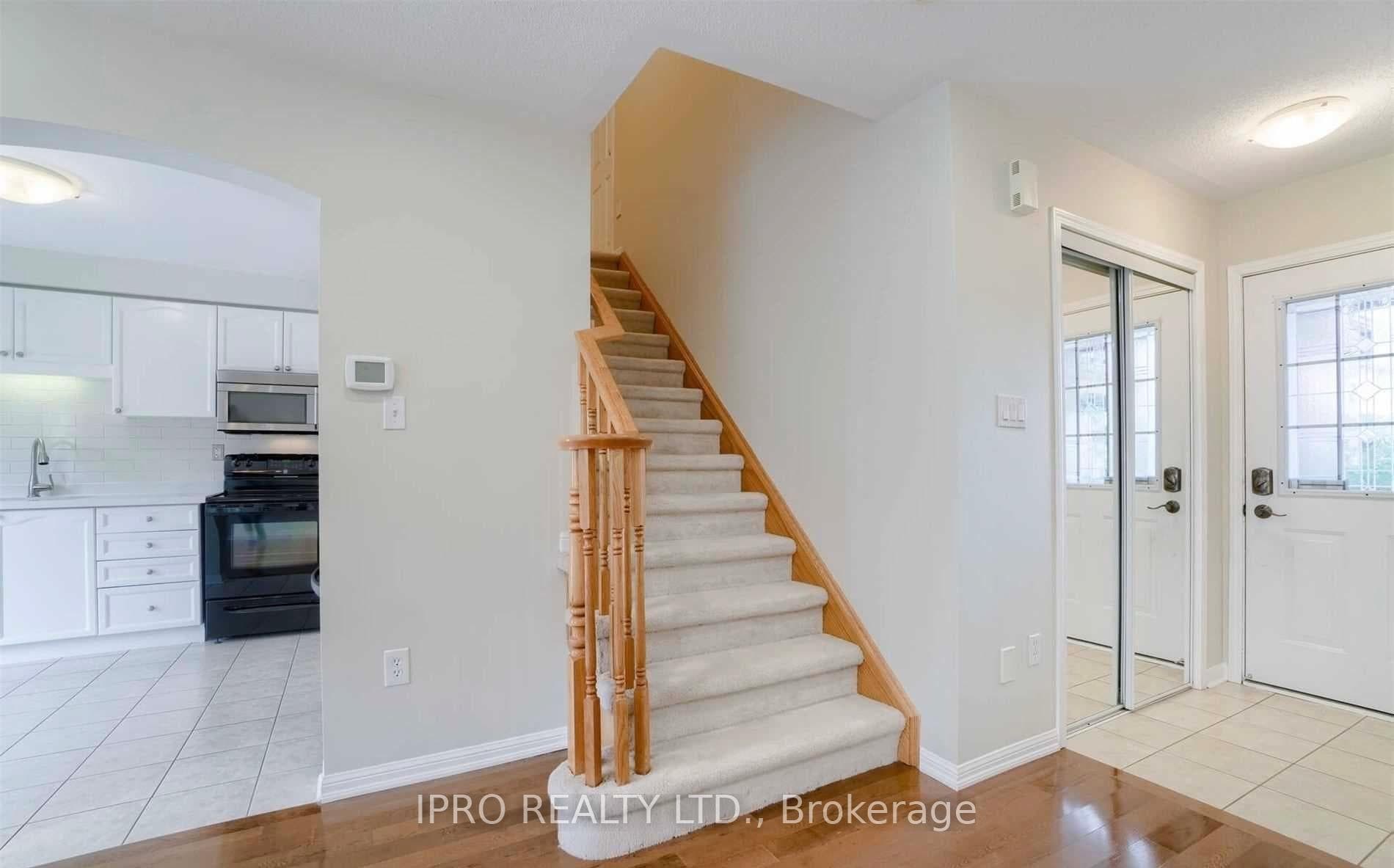 Entry + Stairs to Upper Level