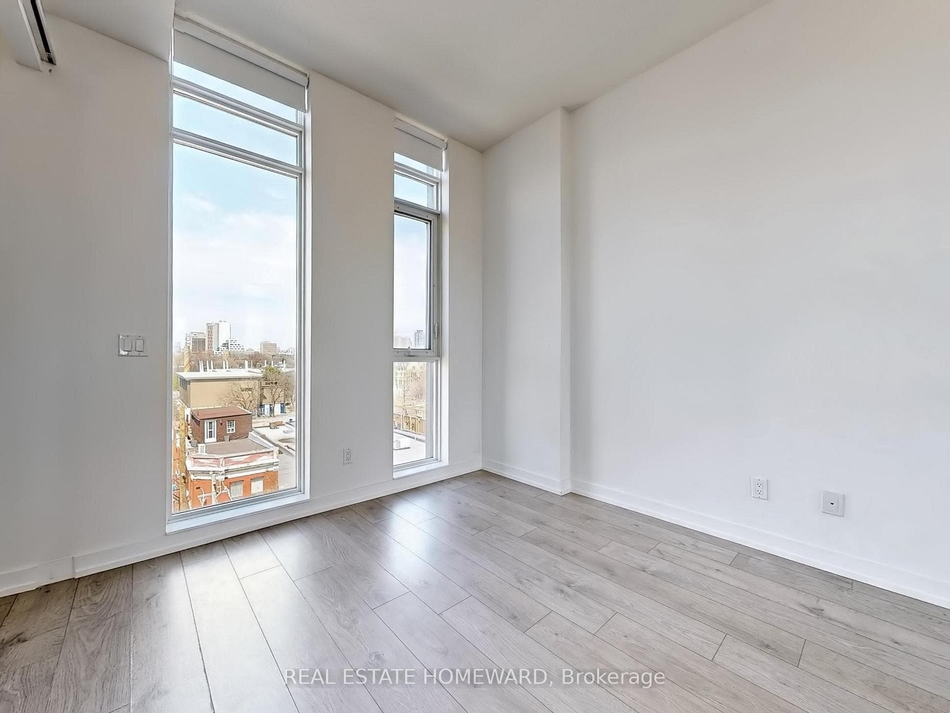 Primary Bedroom with Floor-to-Ceiling Windows