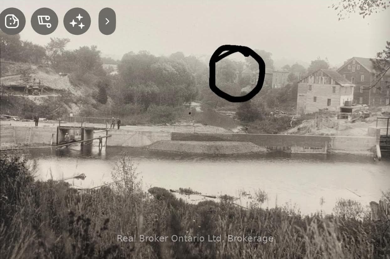 View from Mill Dam of houses before fire