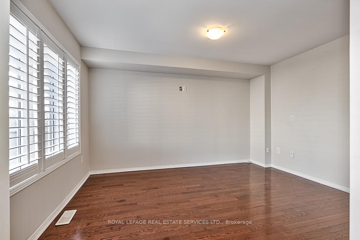 Family Room with Gleaming Hardwood Flooring