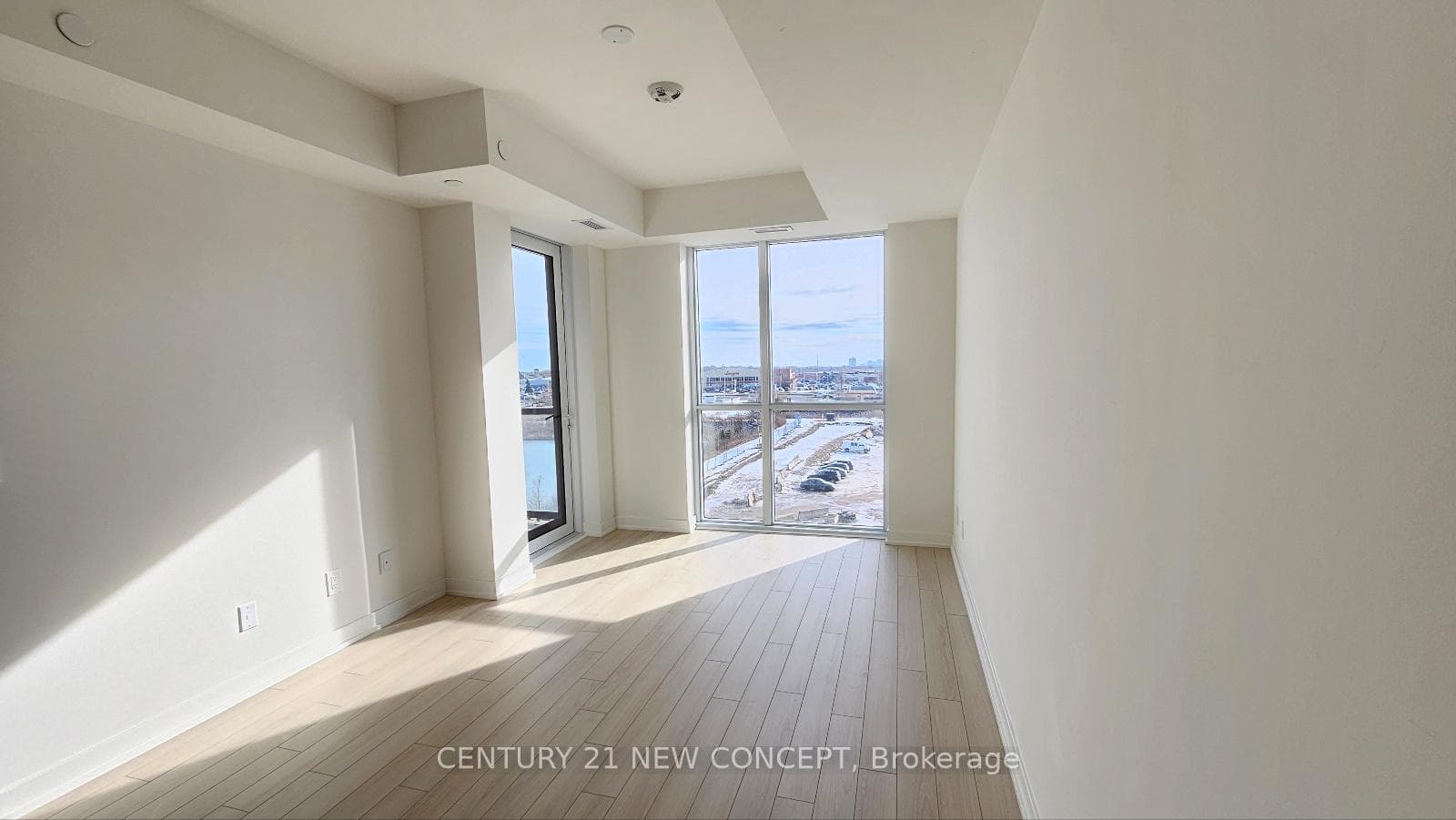Spacious living room with large windows