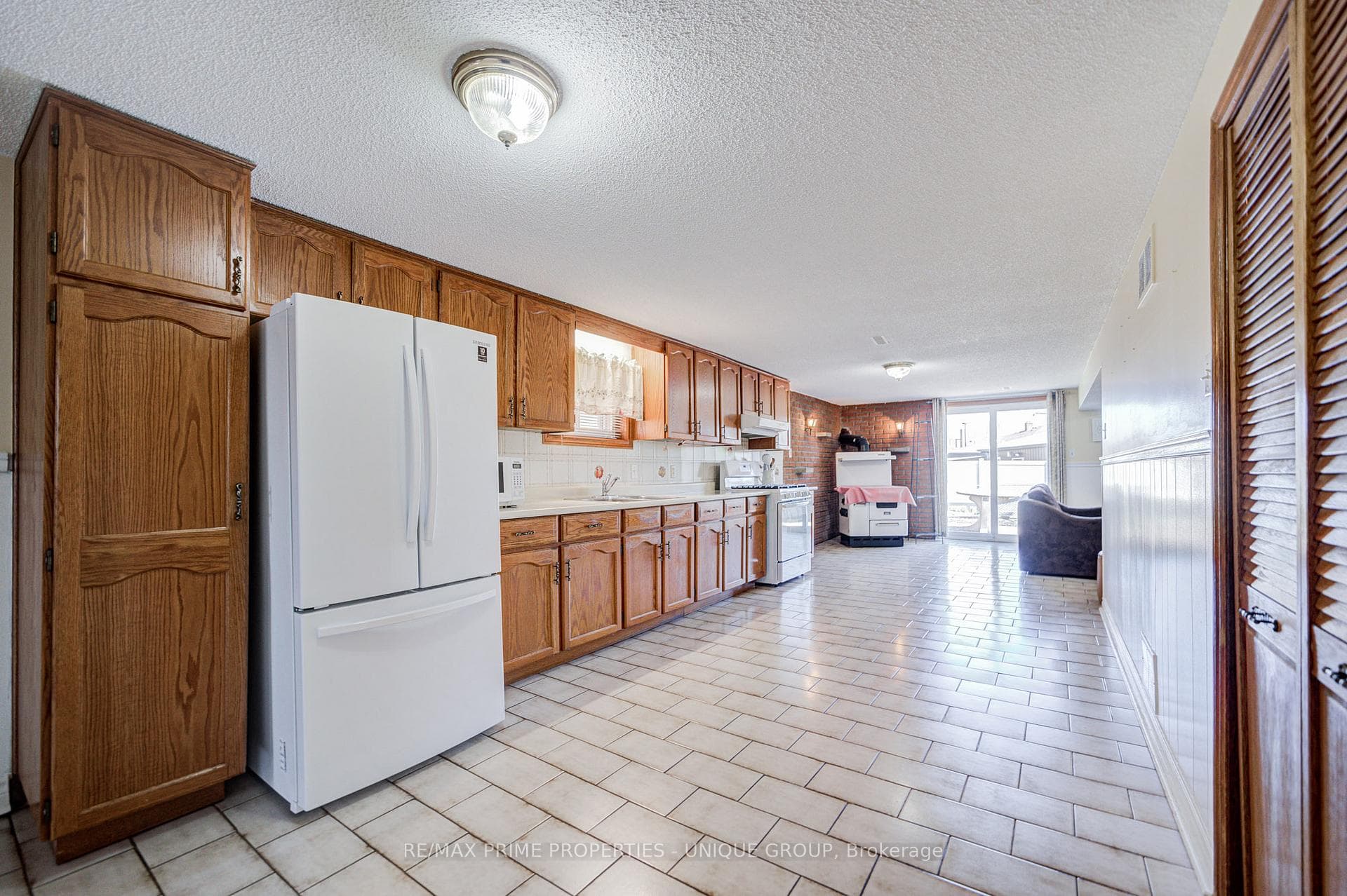 Lower level kitchen area with view towards back.
