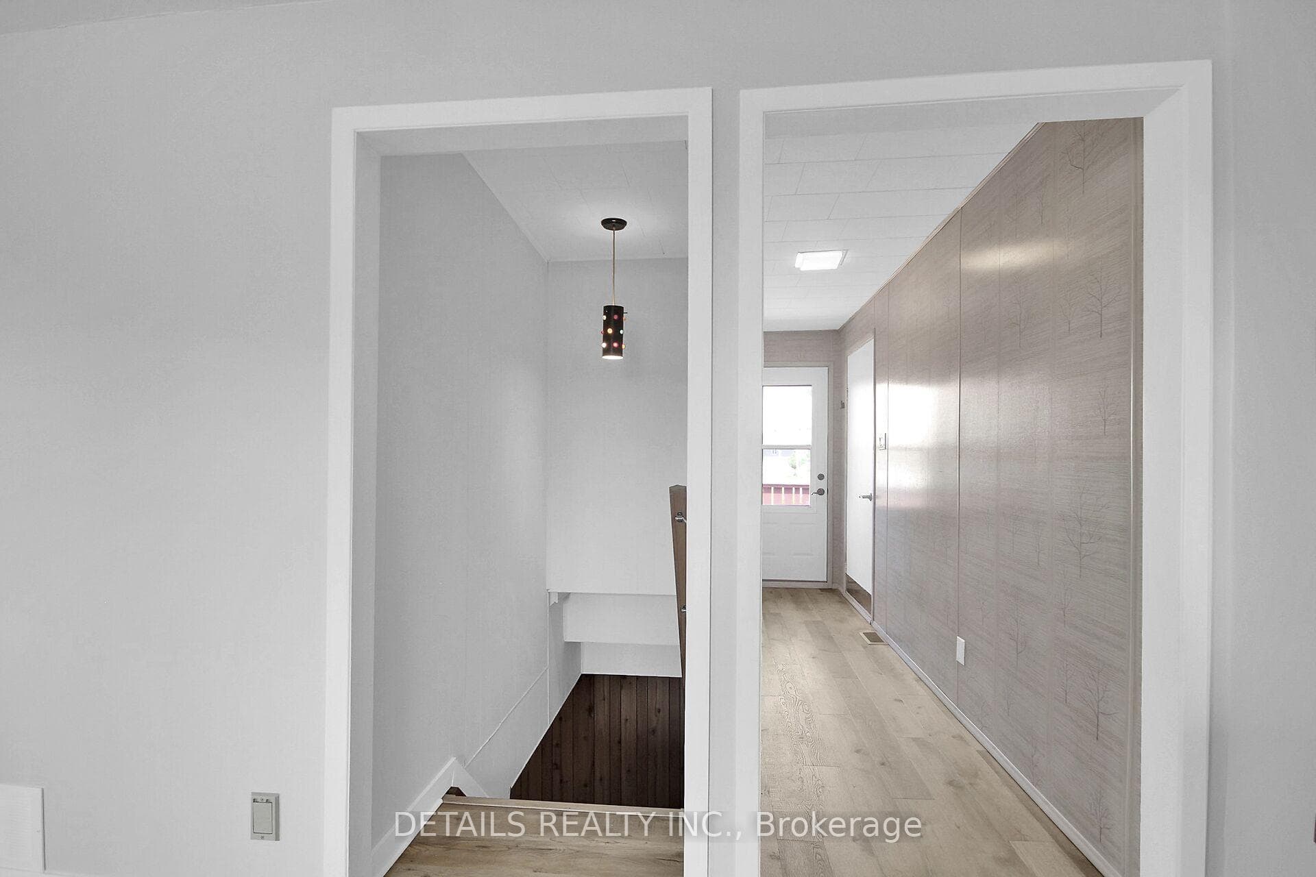 Inside entry from garage and door to back deck.