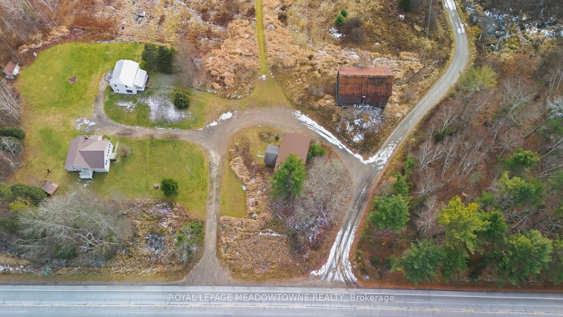 Views of the driveway and Tilson Creek Rd
