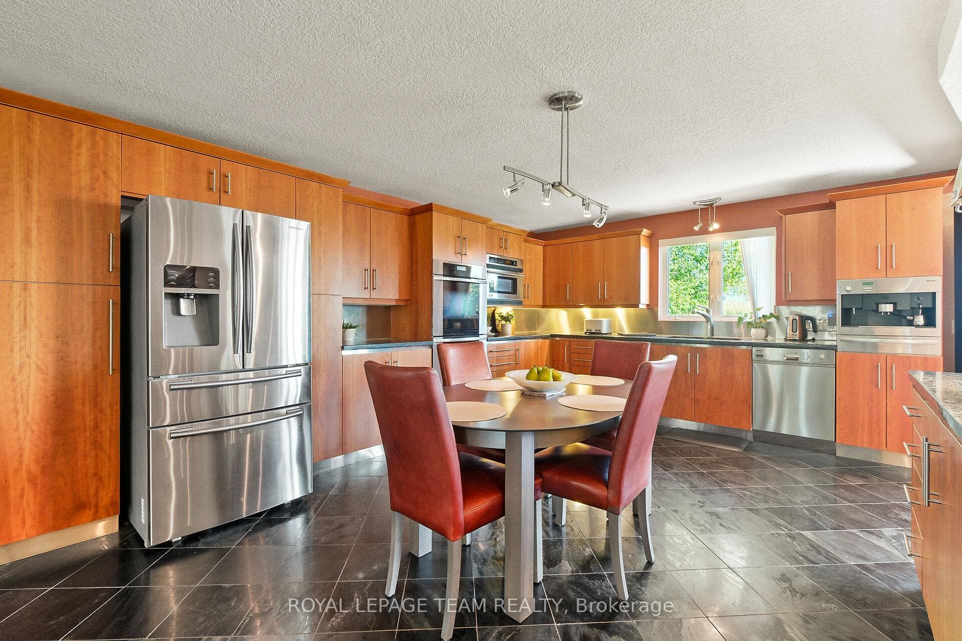 Note the high end stainless appliances.