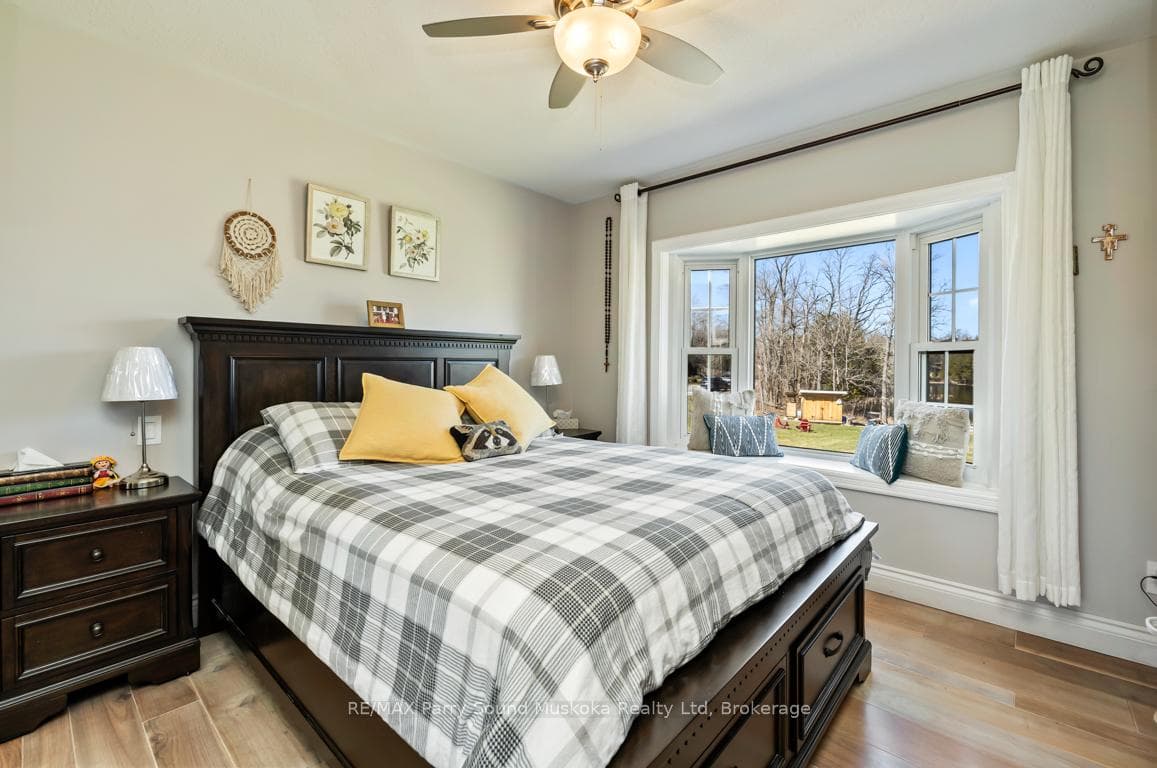 Principal main floor bedroom views lake