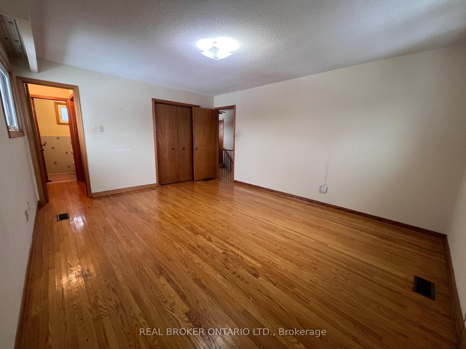 Primary Bedroom walk in closet