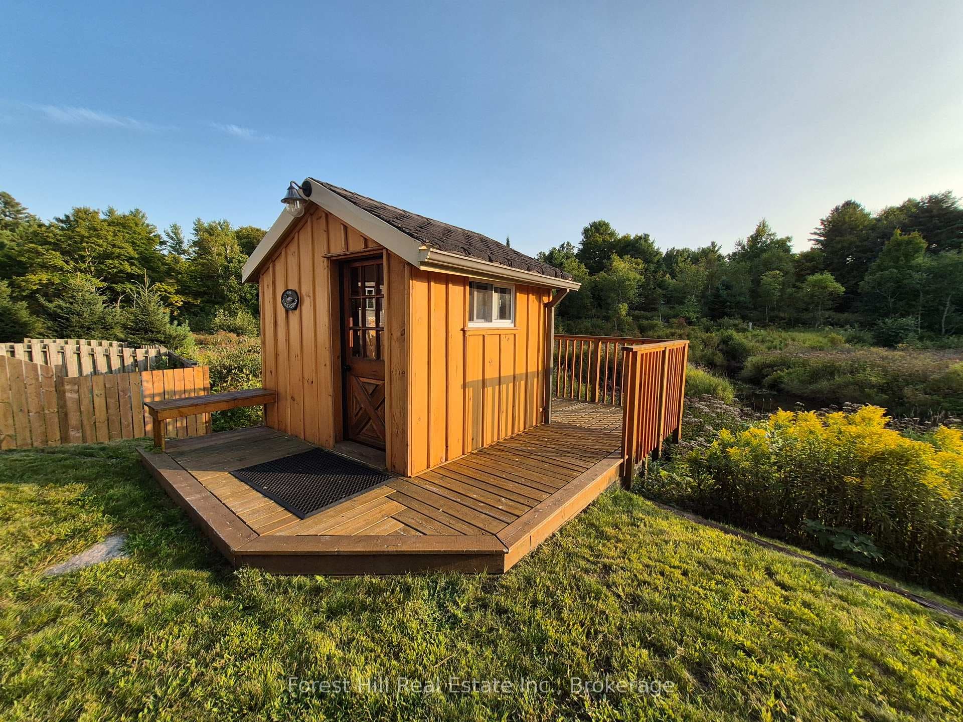 Bunkie with deck over the river