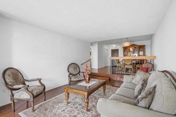 Sunken living room with walk-out to balcony