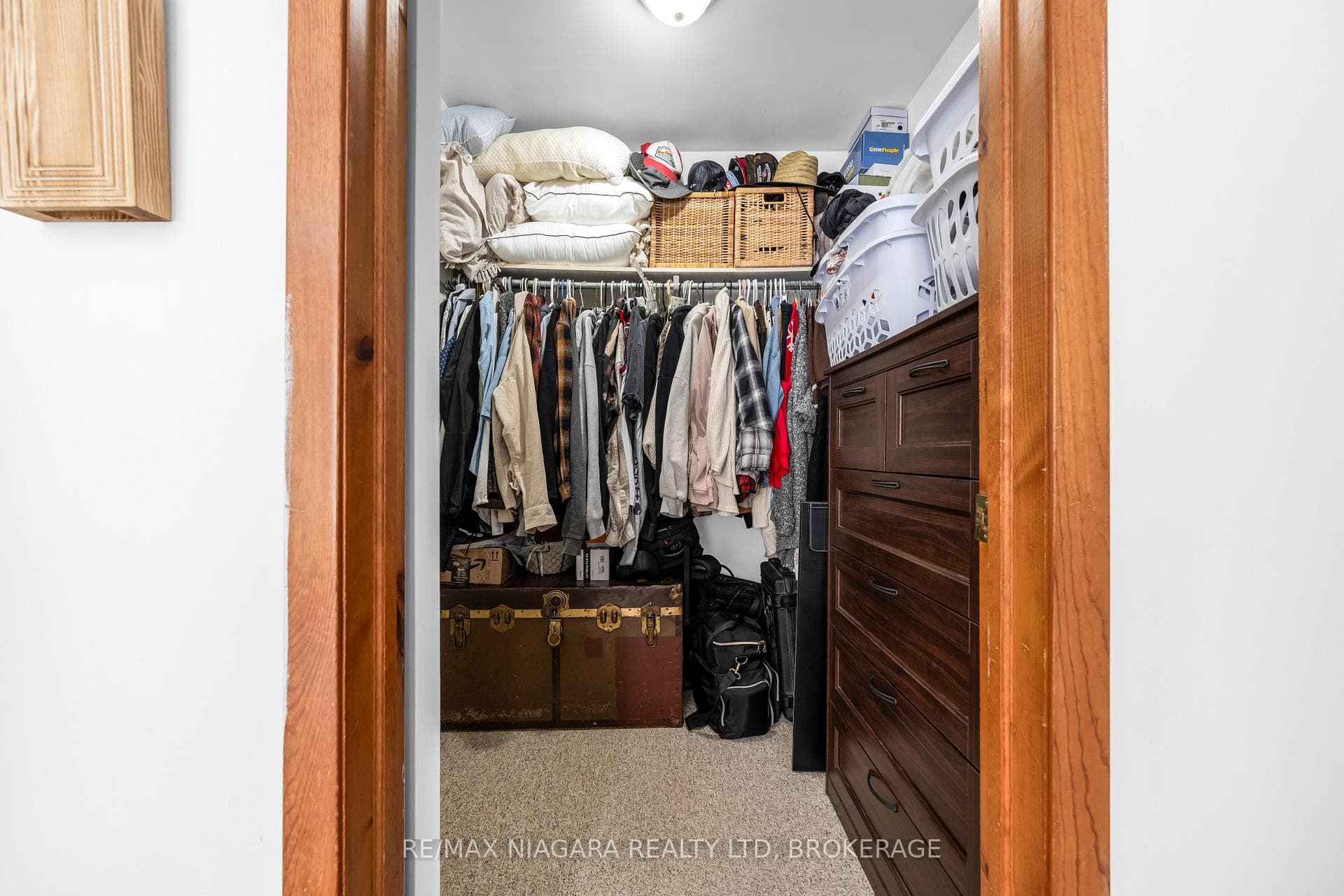 walk in closet in primary bedroom