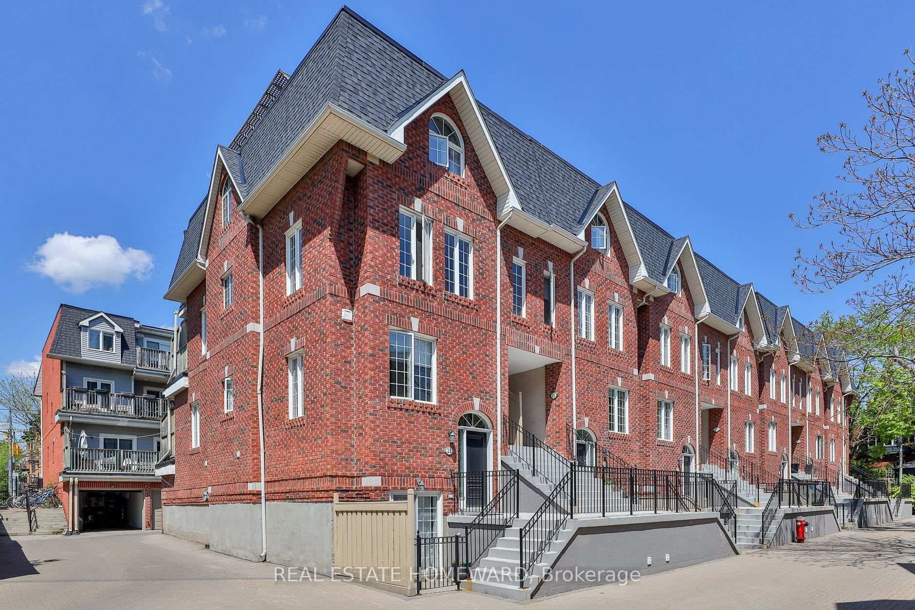 Side of Townhouse/ Entry to Private Garage