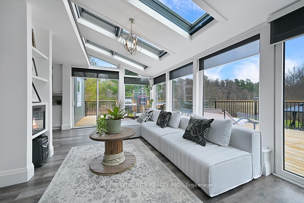 GREAT ROOM WITH REMOTE BLINDS