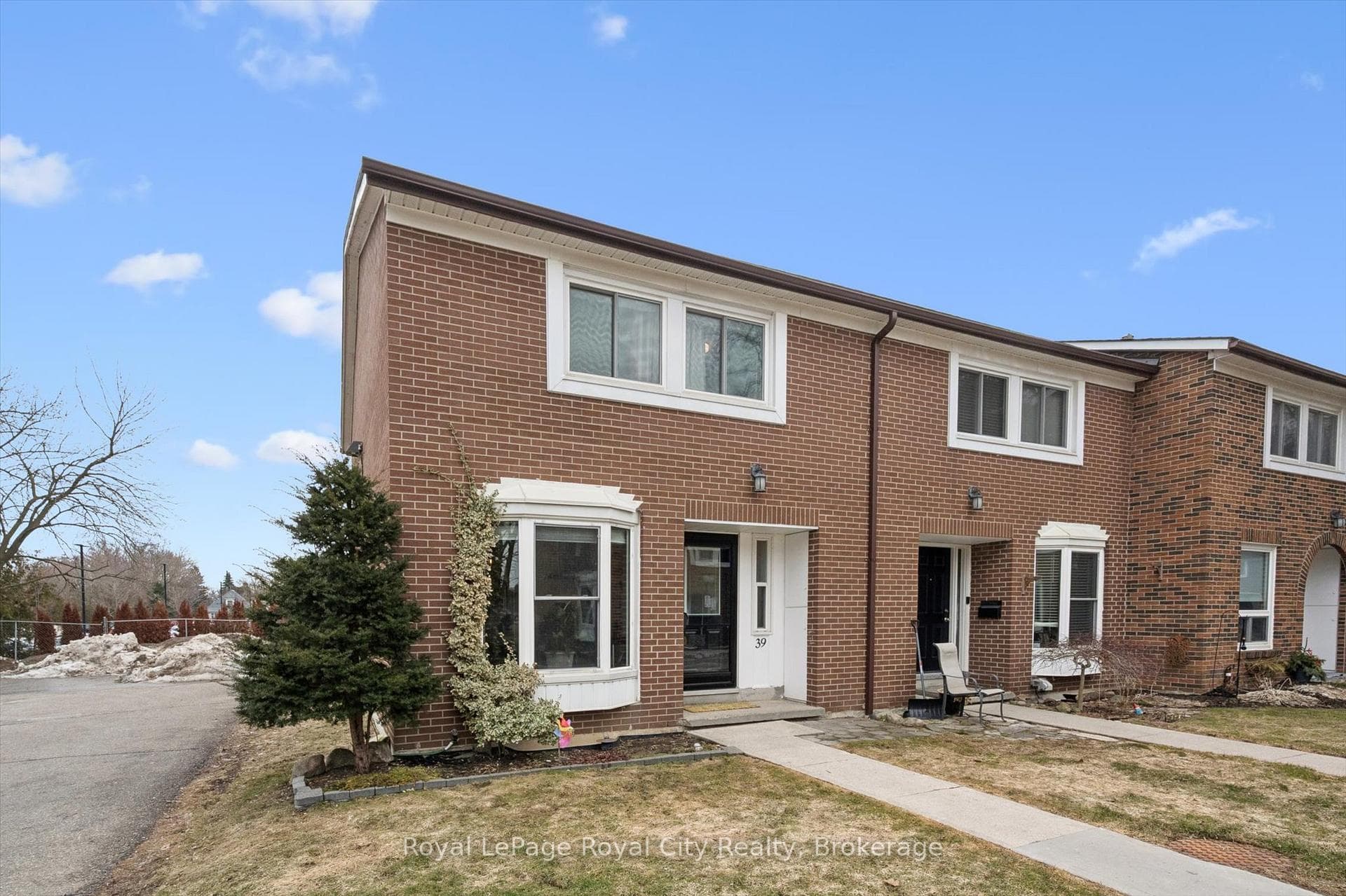 It is an end unit with a south facing back yard