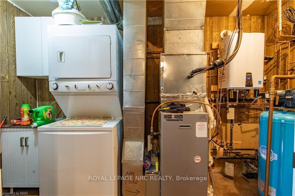 utility/laundry room with hot water on demand