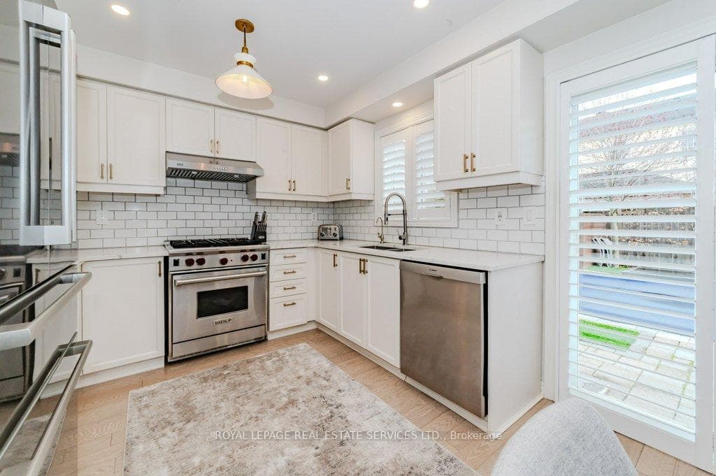Contemporary Kitchen w/Quartz Counters & S/S Appls