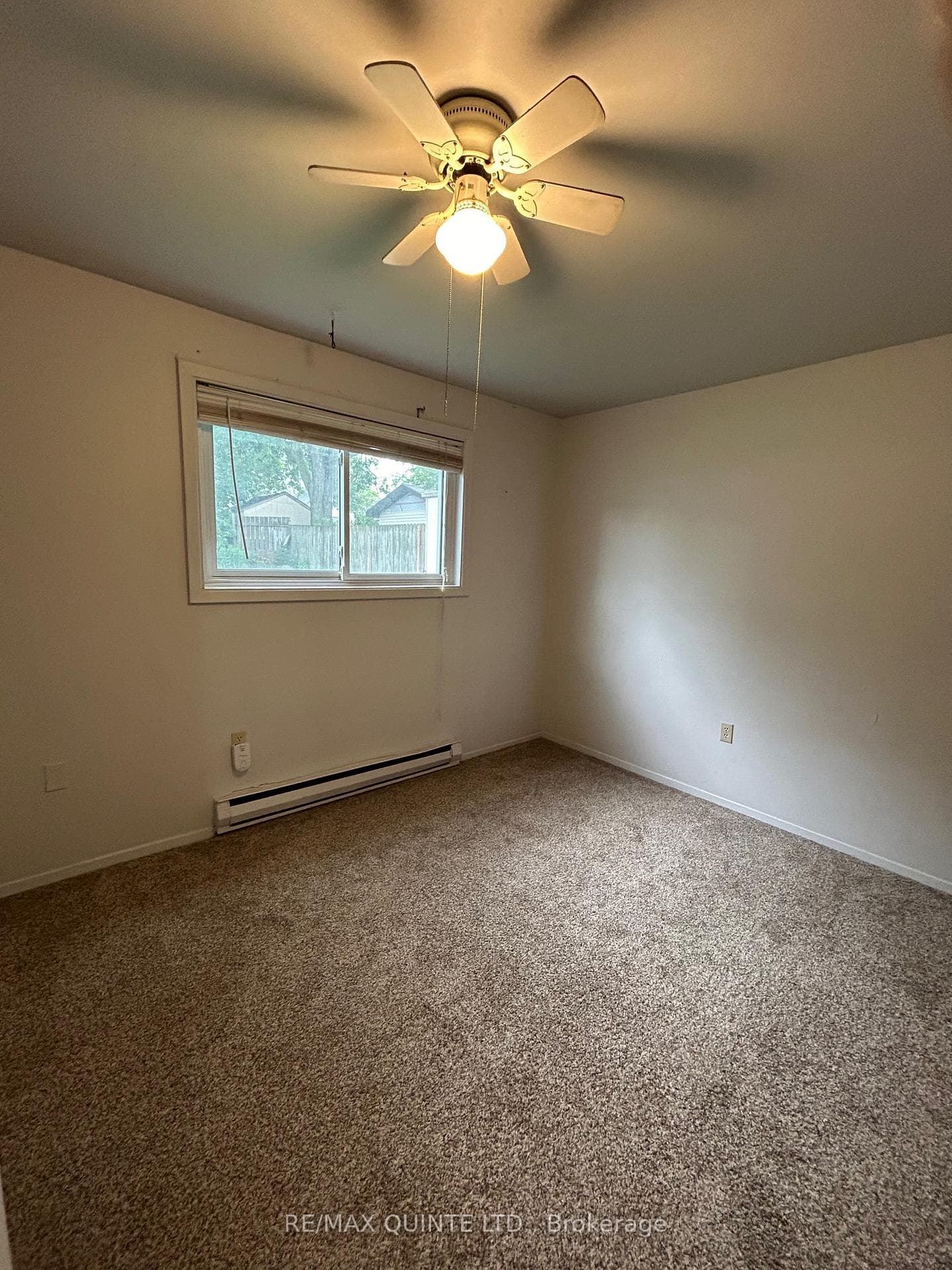 Another large window in bedroom