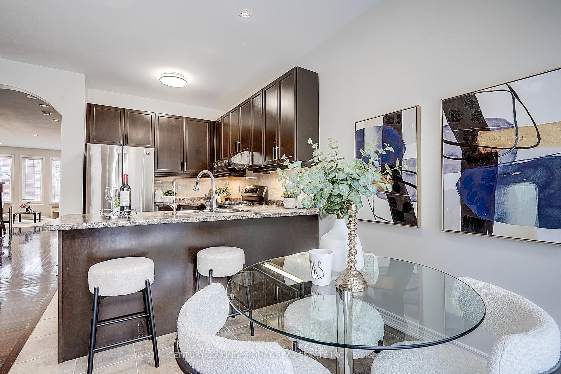 Kitchen overlook family room with open concept