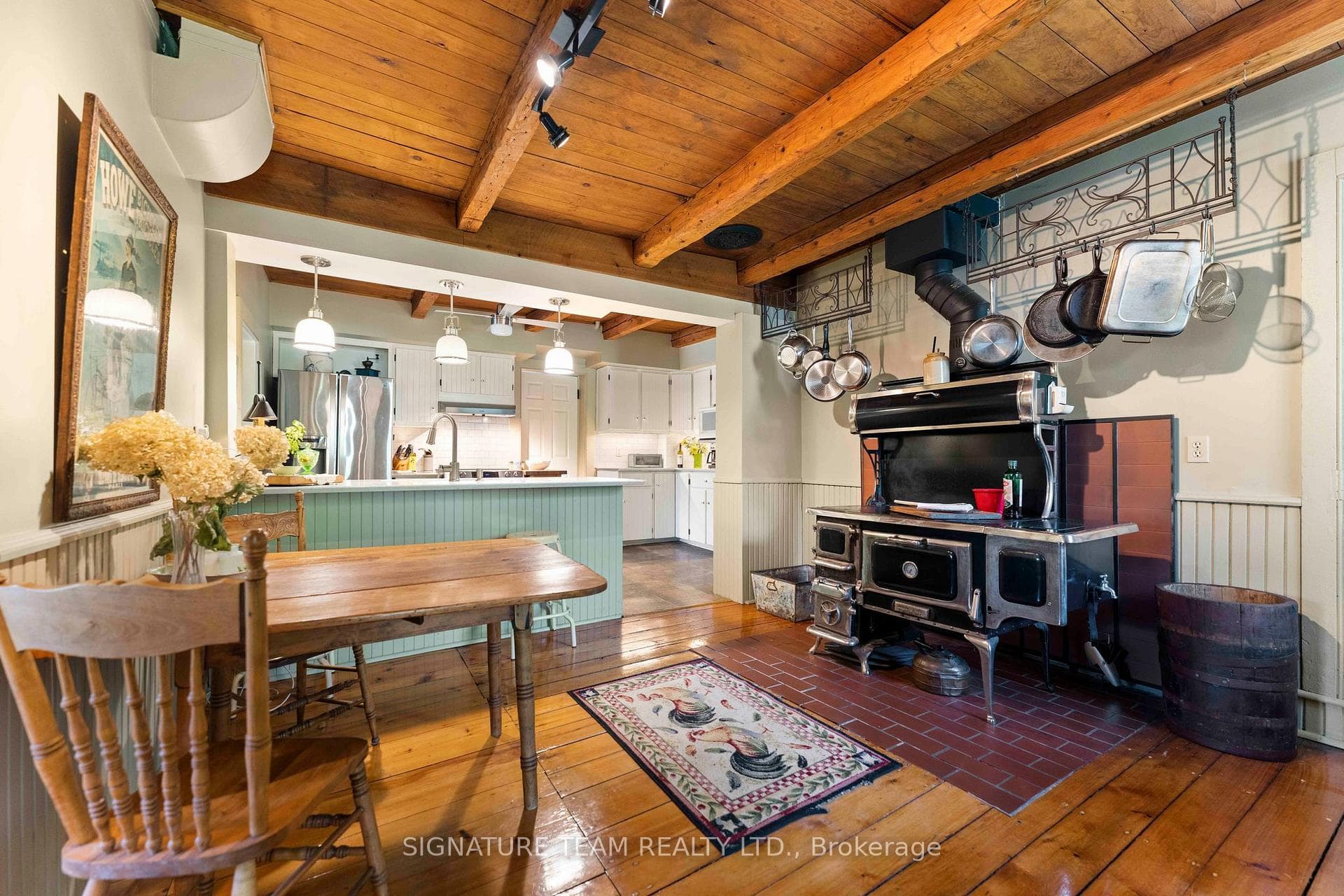Sitting area off the kitchen with wood cookstove