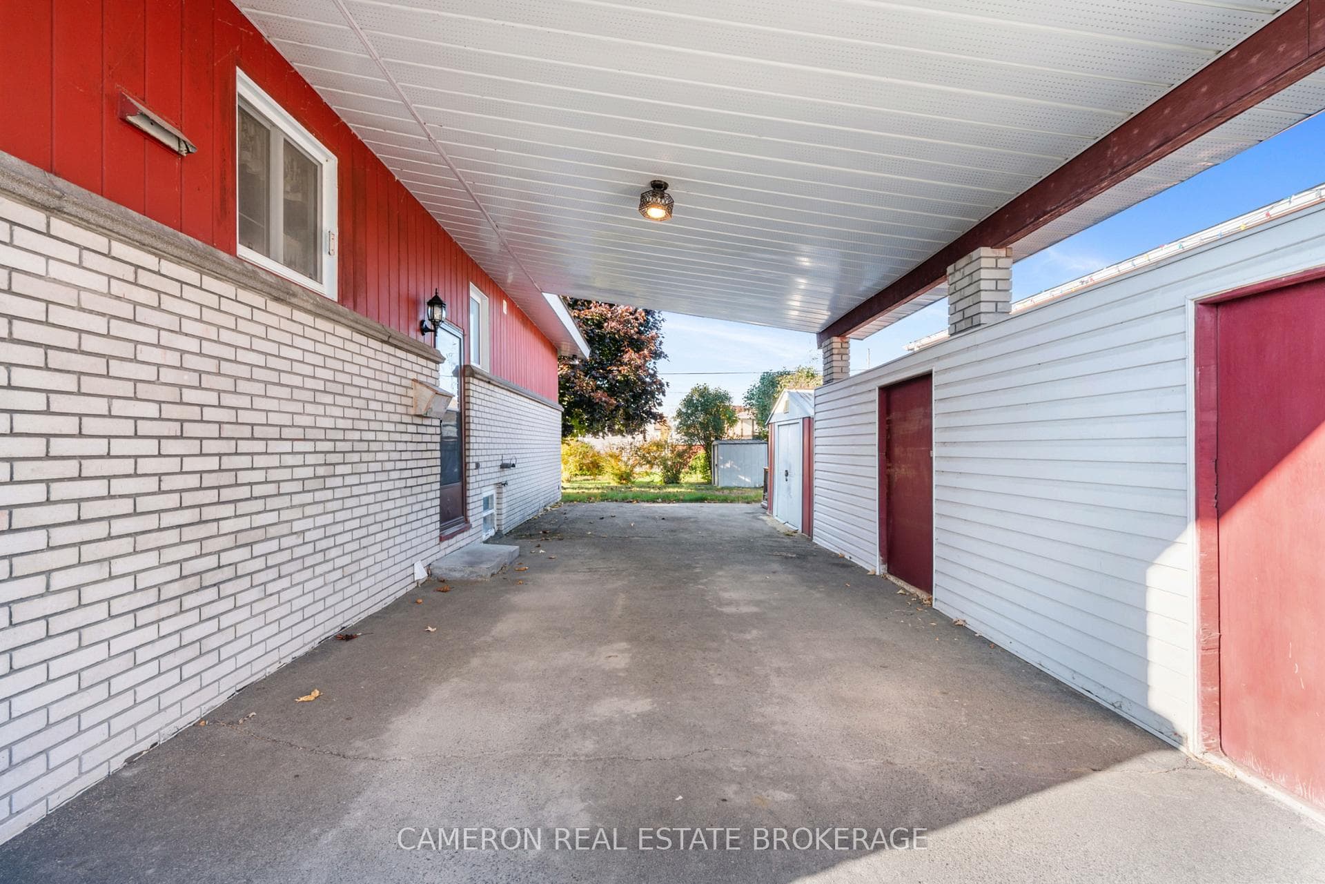 Additional sheds and storage in the carport