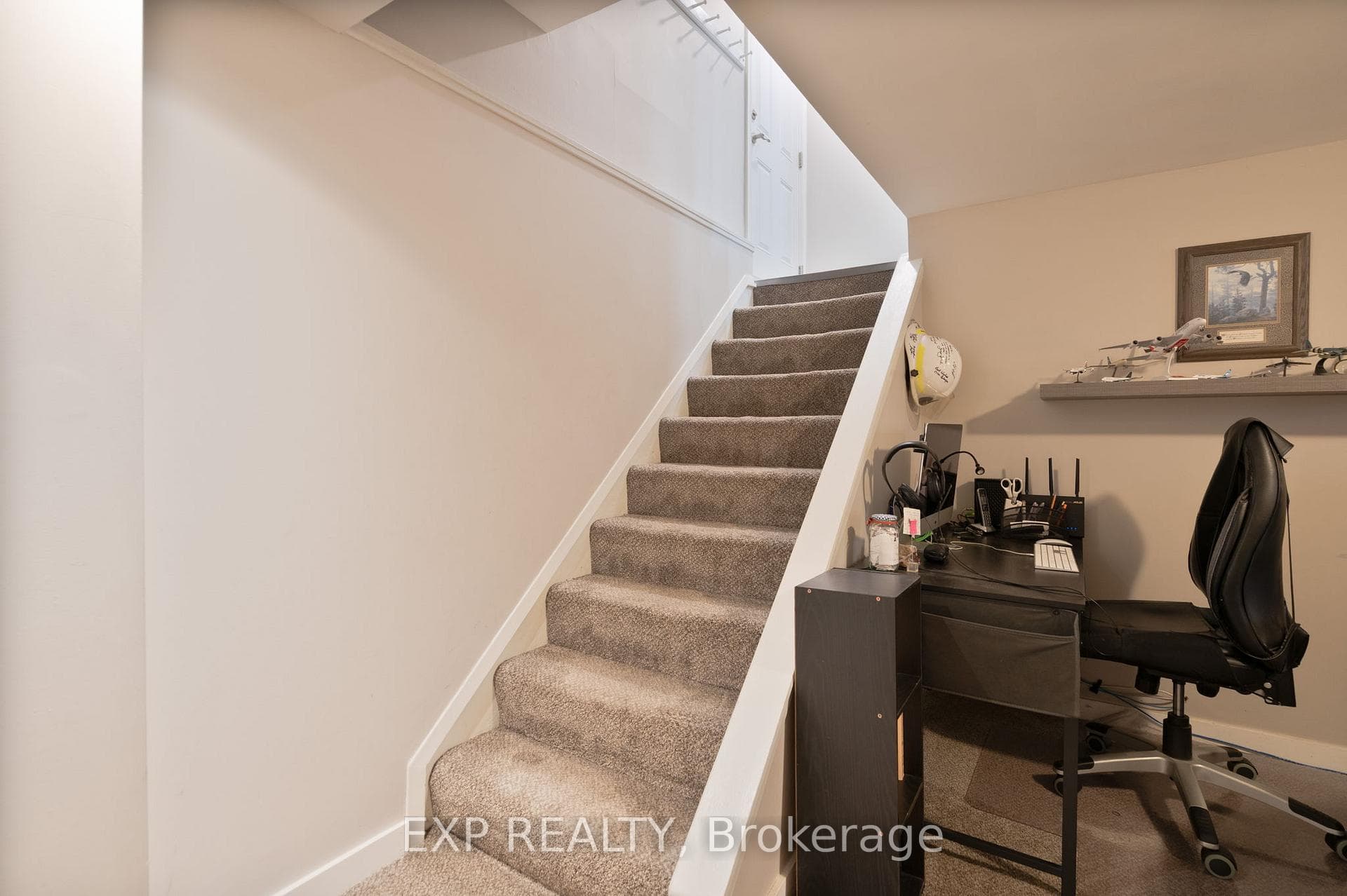 Basement stairs and office area.