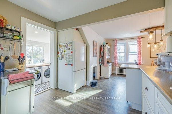Kitchen into laundry room and back porch