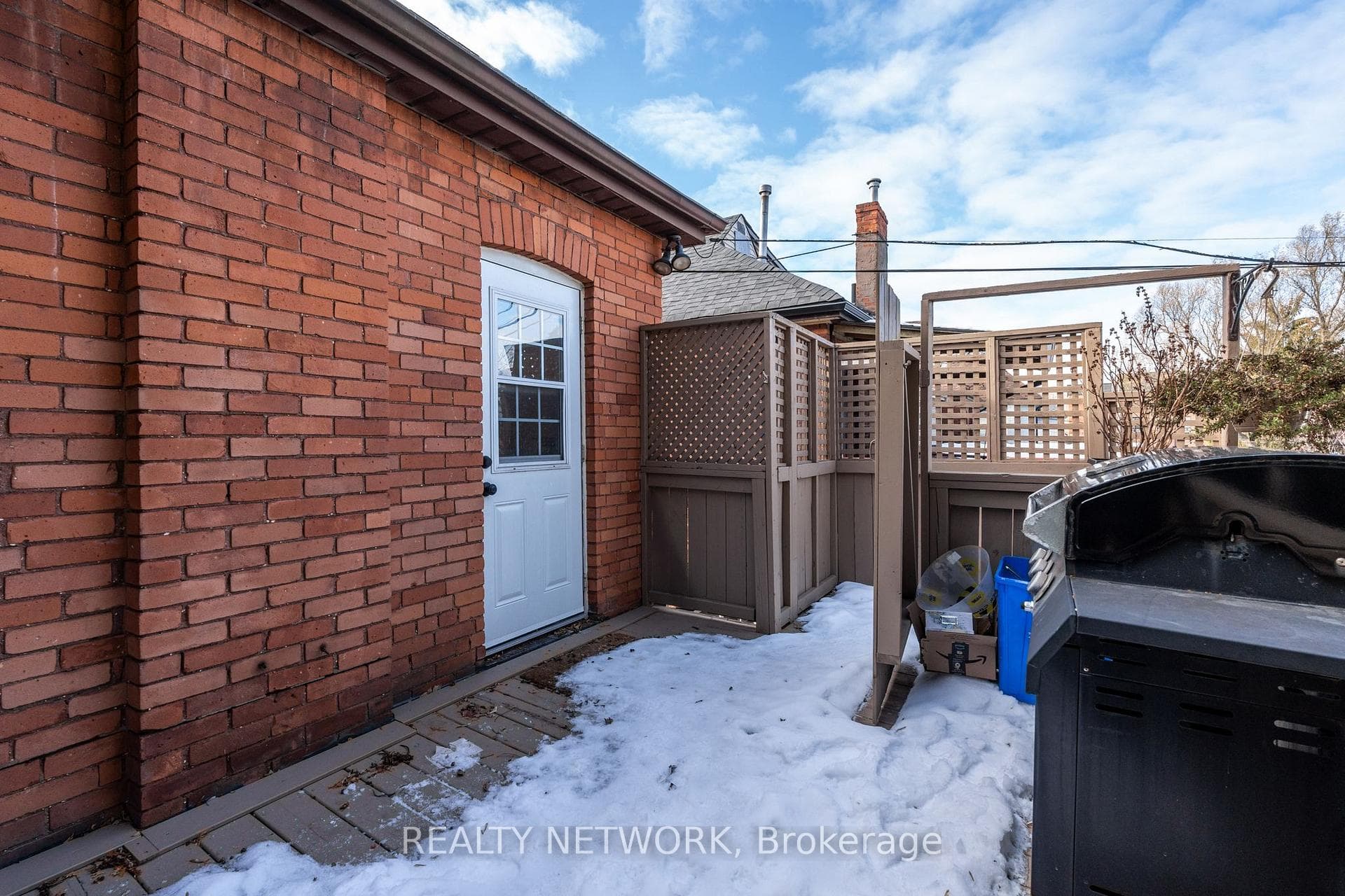 Unit #2's second-floor deck, off the kitchen.