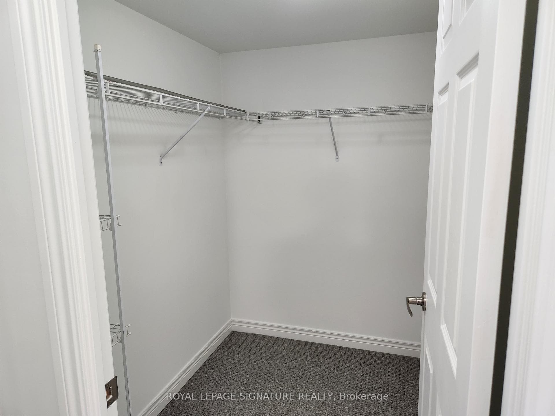 Spacious walk in closet in primary suite