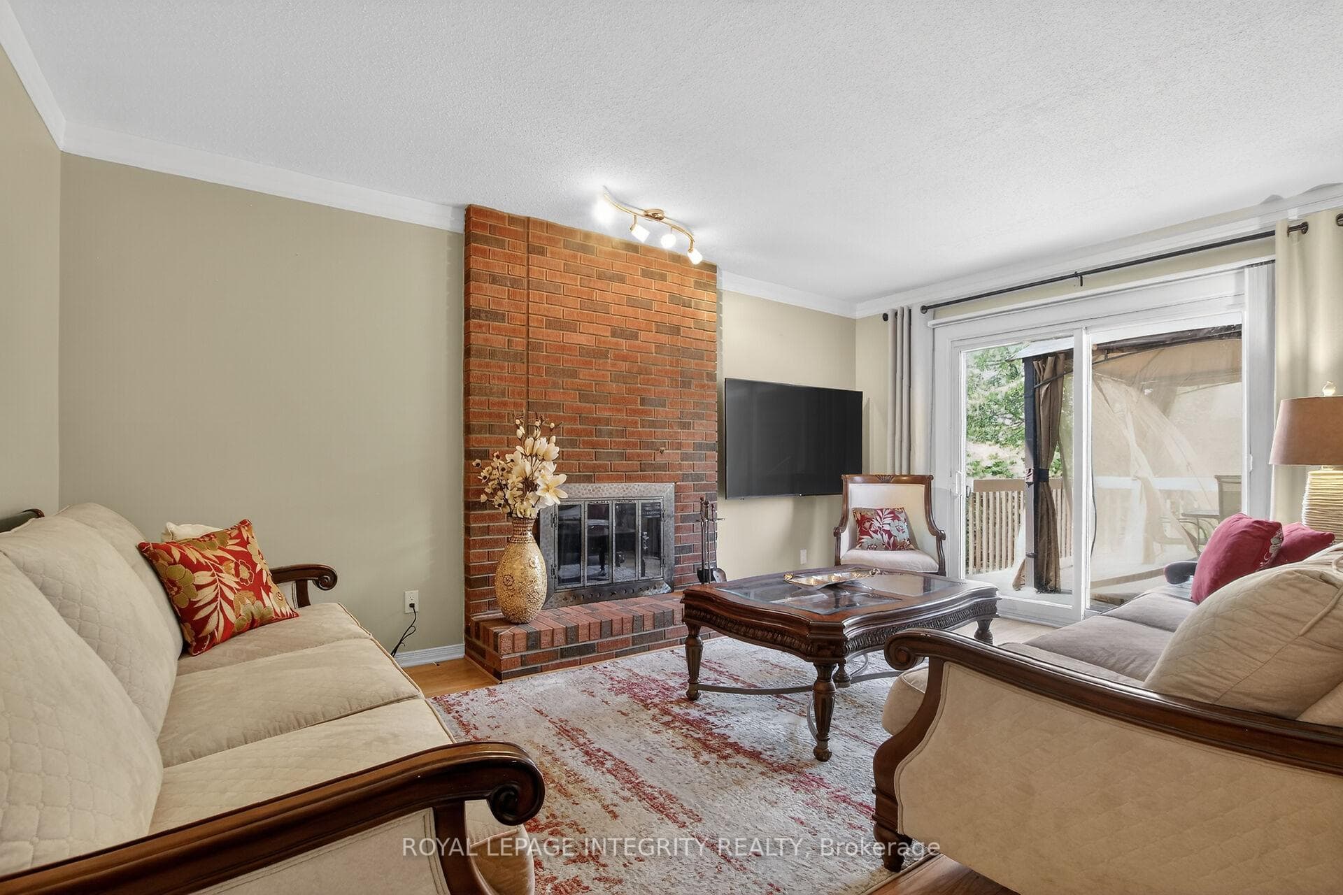 Family room with FP and patio door to large deck
