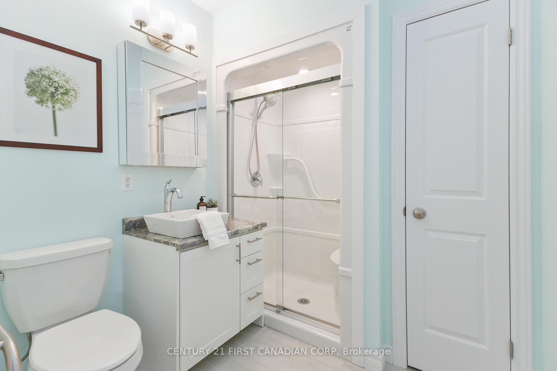 Basement unit bathroom with walk in shower seat