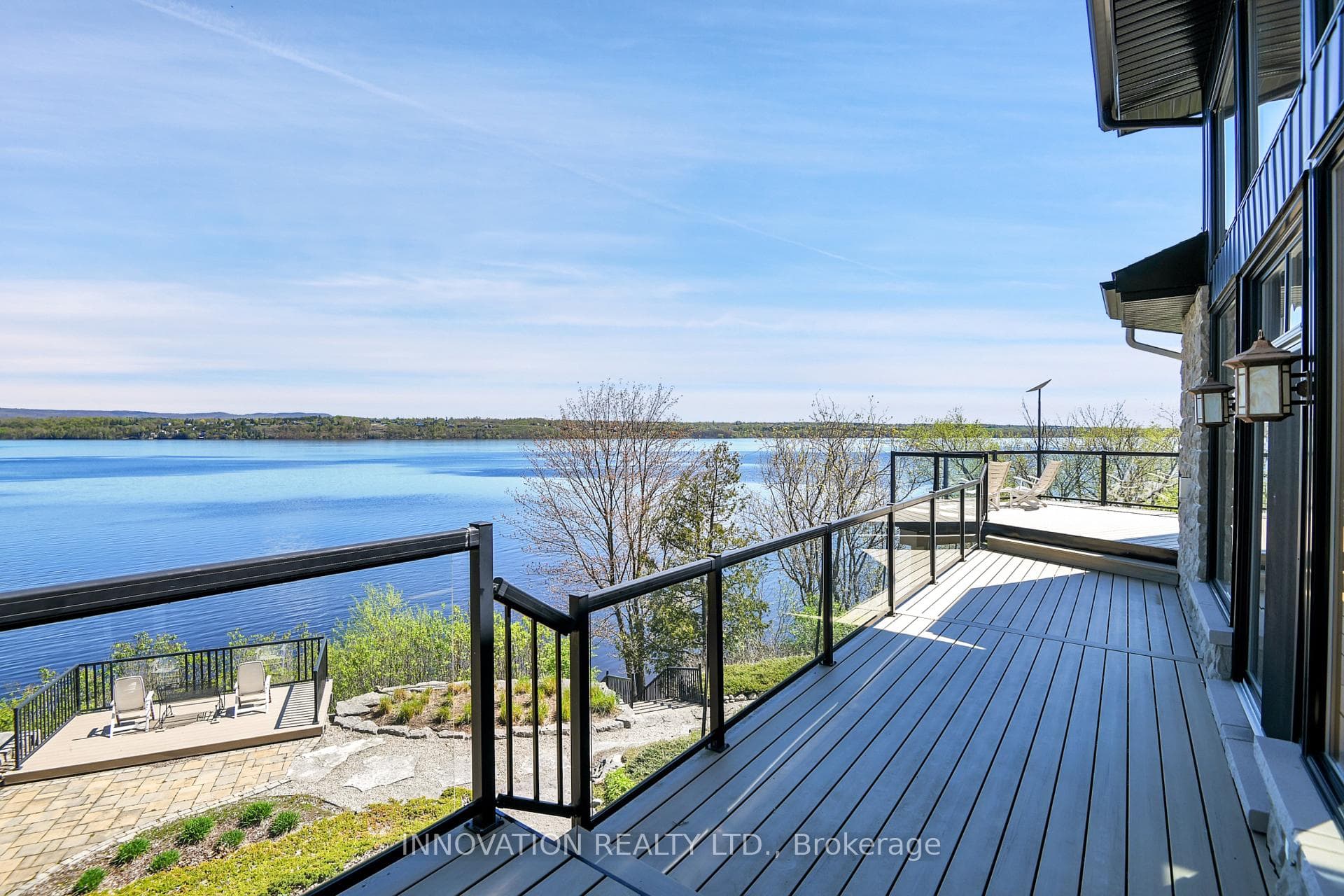 Deck across waterside w/access from Liv/Kit/FR/spa