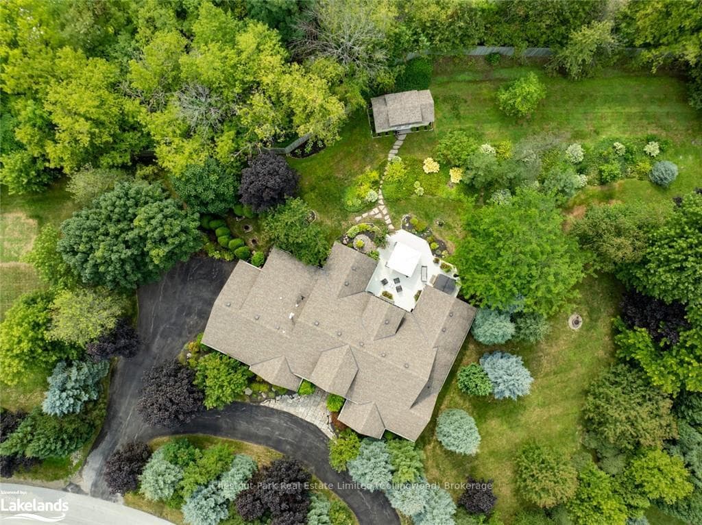 Aerial view of the house on approx 1 acre lot